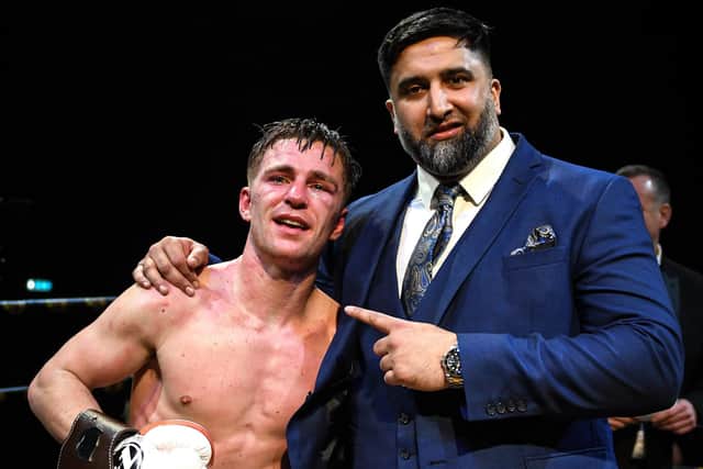 Doncaster's Reece Mould celebrates his win over Hamed Ghaz with promoter Izzy Asif. Photo courtesy of @mcmain_photos.