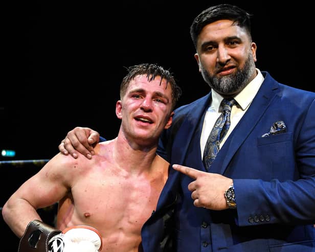 Doncaster's Reece Mould celebrates his win over Hamed Ghaz with promoter Izzy Asif. Photo courtesy of @mcmain_photos.