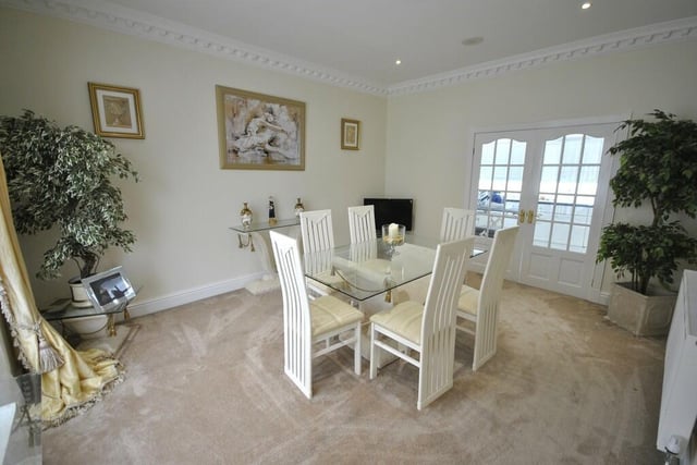 The formal dining room has space for a larger style dining suite.