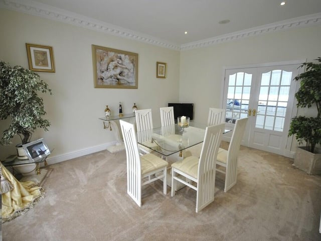 The formal dining room has space for a larger style dining suite.