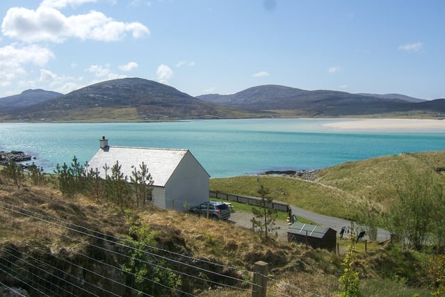 A wonderful detached cottage overlooking the world famous Luskentyre Beach. The property was built in 2003 and has been run as a successful holiday cottage. It offers a large bright open plan living space, with three bedrooms and a bathroom. Currently on sale for 250,000 GBP via Hebridean Estate Agency.
