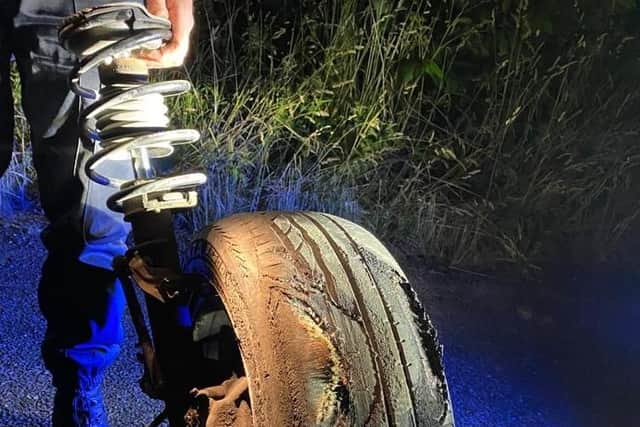The drivers tire flew off.