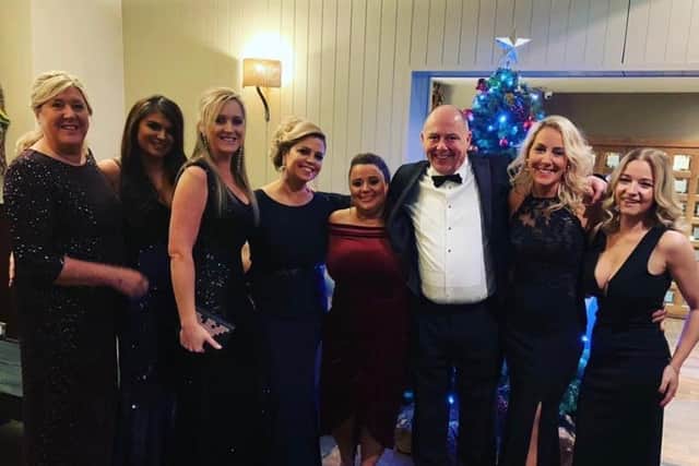 Craig Dowie and some of his female management staff