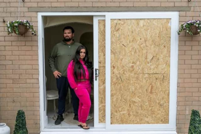 Nikia Marshall, with husband Mike, was attacked by an armed gang who forced their way into her home. (Photo: SWNS).