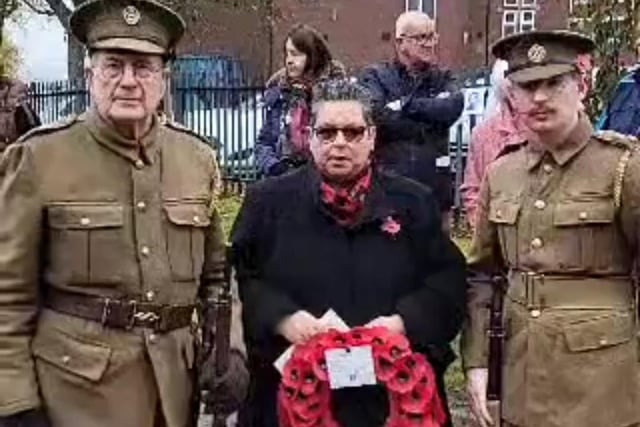 Councillor Bev Chapman after laying a wreath in Mexborough with David and Ben McCabe in their original uniforms.