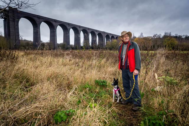 Date: 3rd December 2020.
Picture James Hardisty.
Andrew White, presenter of Walks around Britain, as he and his new dog Magic set's off on one of his favourite walks over and around Conisbrough viaduct, Doncaster.