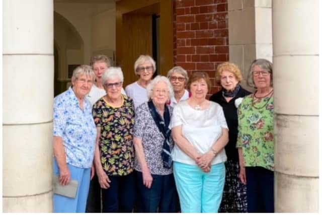 The group of women met up at their old school for afternoon tea.