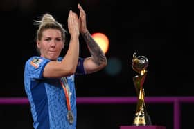 What might have been: Millie Bright of England looks dejected as she walks alongside the FIFA Women's World Cup trophy after the FIFA Women's World Cup Australia & New Zealand 2023 Final match between Spain and England (Picture: Justin Setterfield/Getty Images)