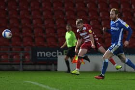 Brad Halliday smashes a shot on goal against Gillingham. Picture: Andrew Roe/AHPIX
