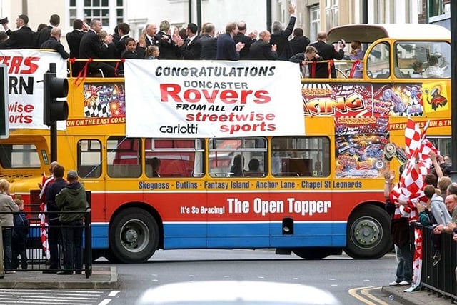 Doncaster Rovers Civic Celebrations.....the open top bus makes its way around Doncaster, May 18, 2003