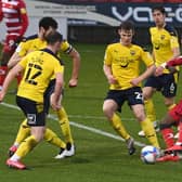 Taylor Richards fires in Doncaster Rovers' third goal against Oxford United. Picture: Andrew Roe/AHPIX