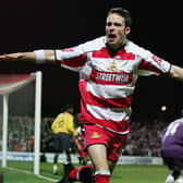 Michael McIndoe celebrates giving Rovers an early lead against Arsenal. Photo: Ross Kinnaird/Getty Images