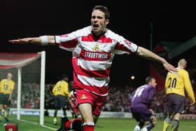 Michael McIndoe celebrates giving Rovers an early lead against Arsenal. Photo: Ross Kinnaird/Getty Images