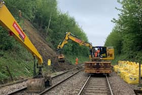 Engineers work to remove soil from site of Scunthorpe landslip.