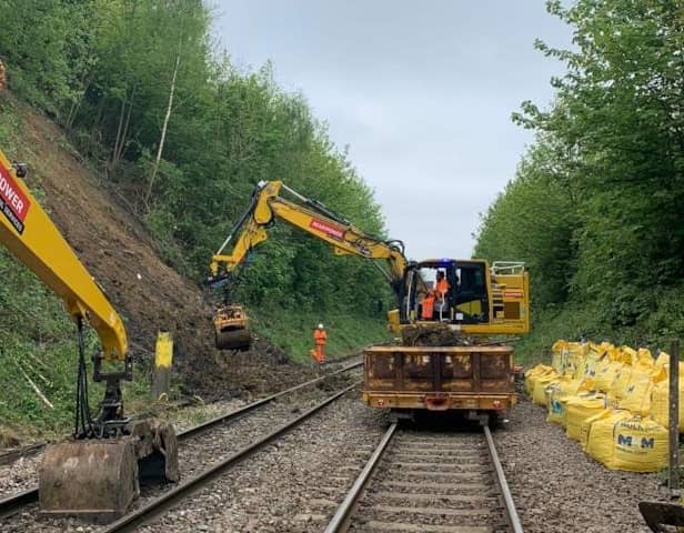 Engineers work to remove soil from site of Scunthorpe landslip.