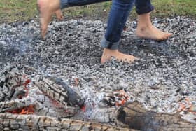 People can learn to walk on hot coals for charity.