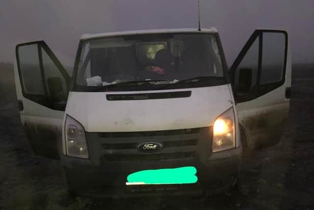 The van was stolen, had false plates and the driver was drunk