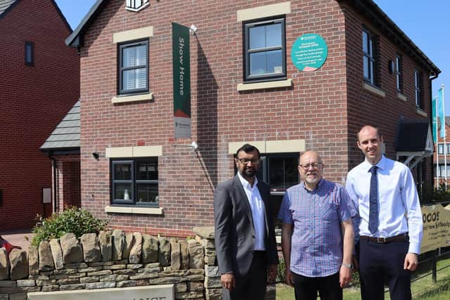 Deputy Mayor Glyn Jones, Councillor Majid Khan and Persimmon Land Manager Liam Hessay