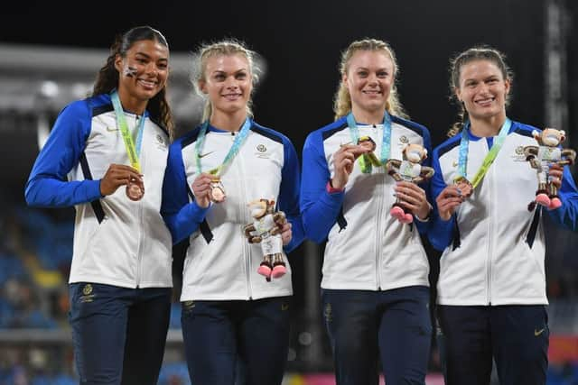 Beth Dobbin, second from right, with fellow bronze medalists Zoey Clark, Jill Cherry and Nicole Yeargin of Team Scotland. Photo: Tom Dulat/Getty Images