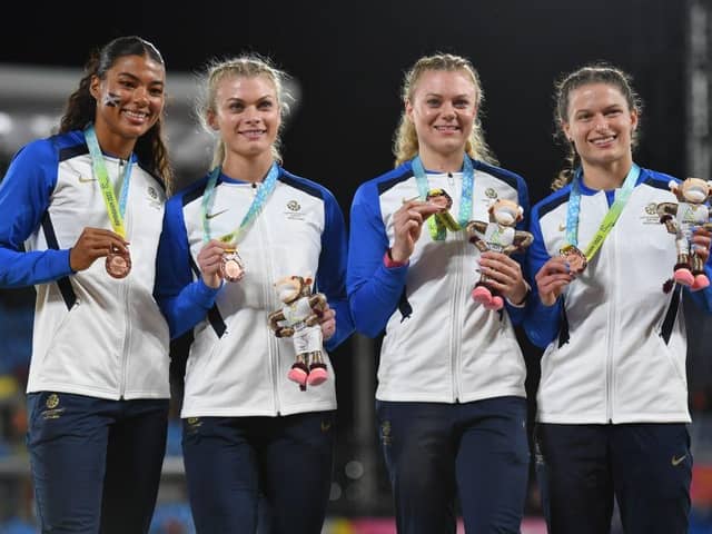 Beth Dobbin, second from right, with fellow bronze medalists Zoey Clark, Jill Cherry and Nicole Yeargin of Team Scotland. Photo: Tom Dulat/Getty Images