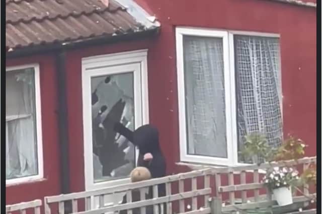 A gang of teenage yobs were filmed carrying out a shocking attack on the property.