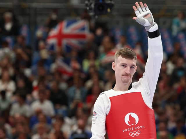Britain's Bradly Sinden gestures prior to competing in the taekwondo men's -68kg at Paris 2024. (Photo by DAVID GRAY/AFP via Getty Images)