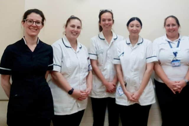 Michaela with her colleagues.