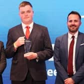 Thomas Green is handed his award at the Referee Recognition Awards 2024.