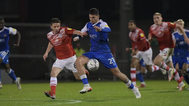 Tiago Cukur looks to get away from Crewe's Tom Lowery. Picture: Howard Roe/AHPIX