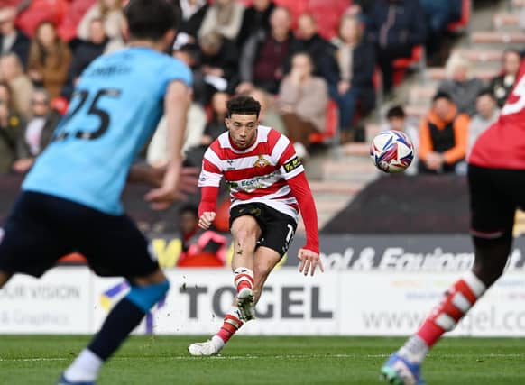 Picture Howard Roe/AHPIX LTD; Football, SkyBet; League Two;
Doncaster Rovers v Crewe;
12/10/2024 3.00 pm; Eco-Power Stadium;
Doncasters' Jordan Gibson goes close with his free kick