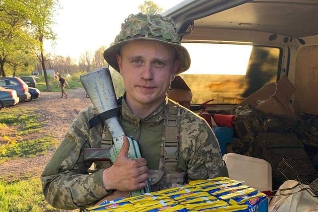 Ukrainian soldier after receiving package.