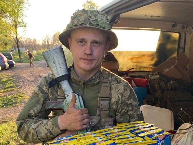Ukrainian soldier after receiving package.