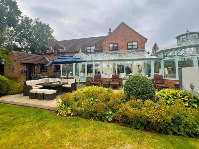 Landscaped gardens have seating areas for the warmer months of the year.