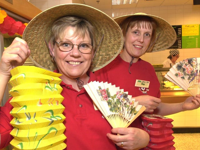 Seen in the restaurant  celebrating Chinese New Year in 2001 were LtoR, Elaine Hague, and Susan Zielinski.