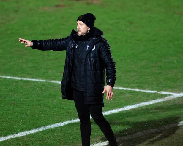 DONCASTER, ENGLAND - MARCH 24: Jon Brady, Manager of Port Vale, react during the Sky Bet League One match between Doncaster Rovers and Port Vale at Eco-Power Stadium on March 24, 2026 in Doncaster, England. (Photo by Jess Hornby/Getty Images)