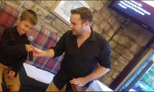 Johnny Gibson with Charlie Gibson at one of his quizzes