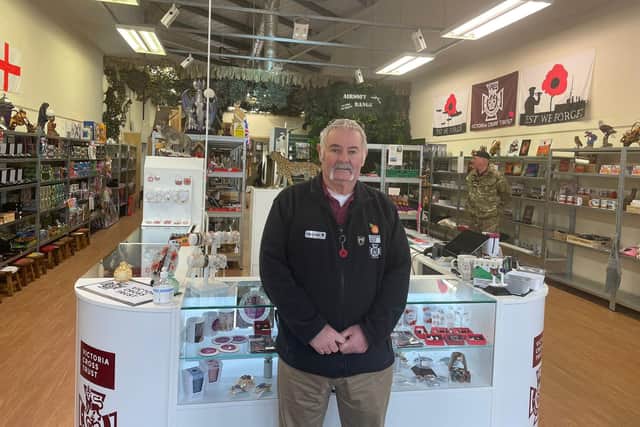 Graham from the Victoria Cross Trust shop at Lakeside Village