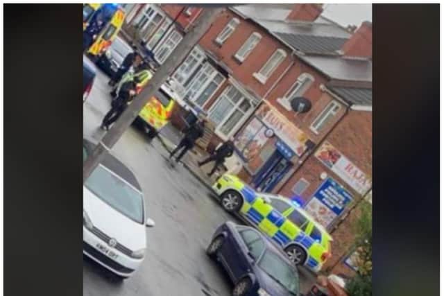 Police were called to the street in Wheatley this morning after a man entered a shop with a gun.