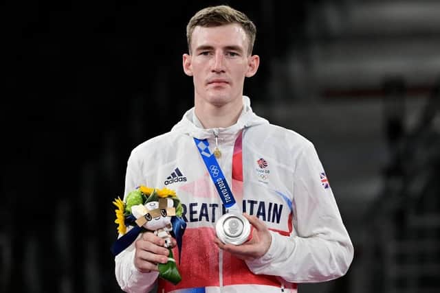 Bradly Sinden with his Olympic silver medal. Photo: JAVIER SORIANO/AFP via Getty Images