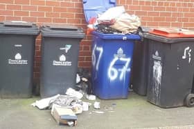 Residents of a Doncaster street had their bins left full after notices about recycling were attached.