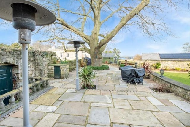 A large patio area is ideal for sitting outside or entertaining.