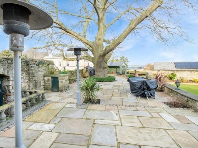 A large patio area is ideal for sitting outside or entertaining.
