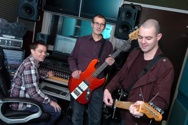 John White (centre) and James Foy (right), two local singers are pictured with Higher Rhythm engineer Darren Feris.