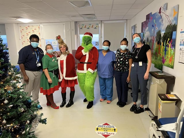 Grinch and Cindy Lou with staff