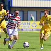 Lee Tomlin, or Trialist B, in action against Nuneaton Borough. Photo: Andrew Roe/AHPIX LTD.