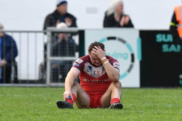 A dejected Alex Holdstock is pictured after the final whistle. Picture by Howard Roe/AHPIX.com