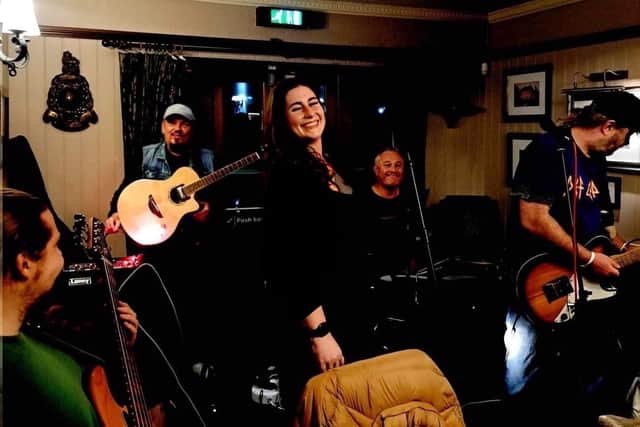 Phoebe singing with one of the pub's regular bands “The Counterfeit Celts".