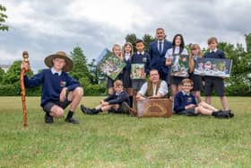 Robert Clubbe, Mark Fraser and Dunsville pupils with story props