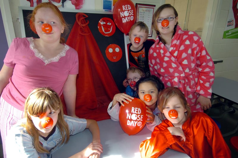 From left, Hayley Badger, Leanne Oxley, Daniel Hardwick, Charlie Haywood Heath, Jimjar Kongpan, Rosie Billam and Demi Spencer with their display for Red Nose Day 2009 at Valley Park Primary School