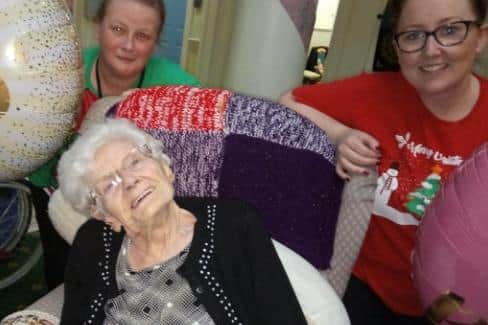 Minnie Liddle with her carers at Wynthorpe Hall